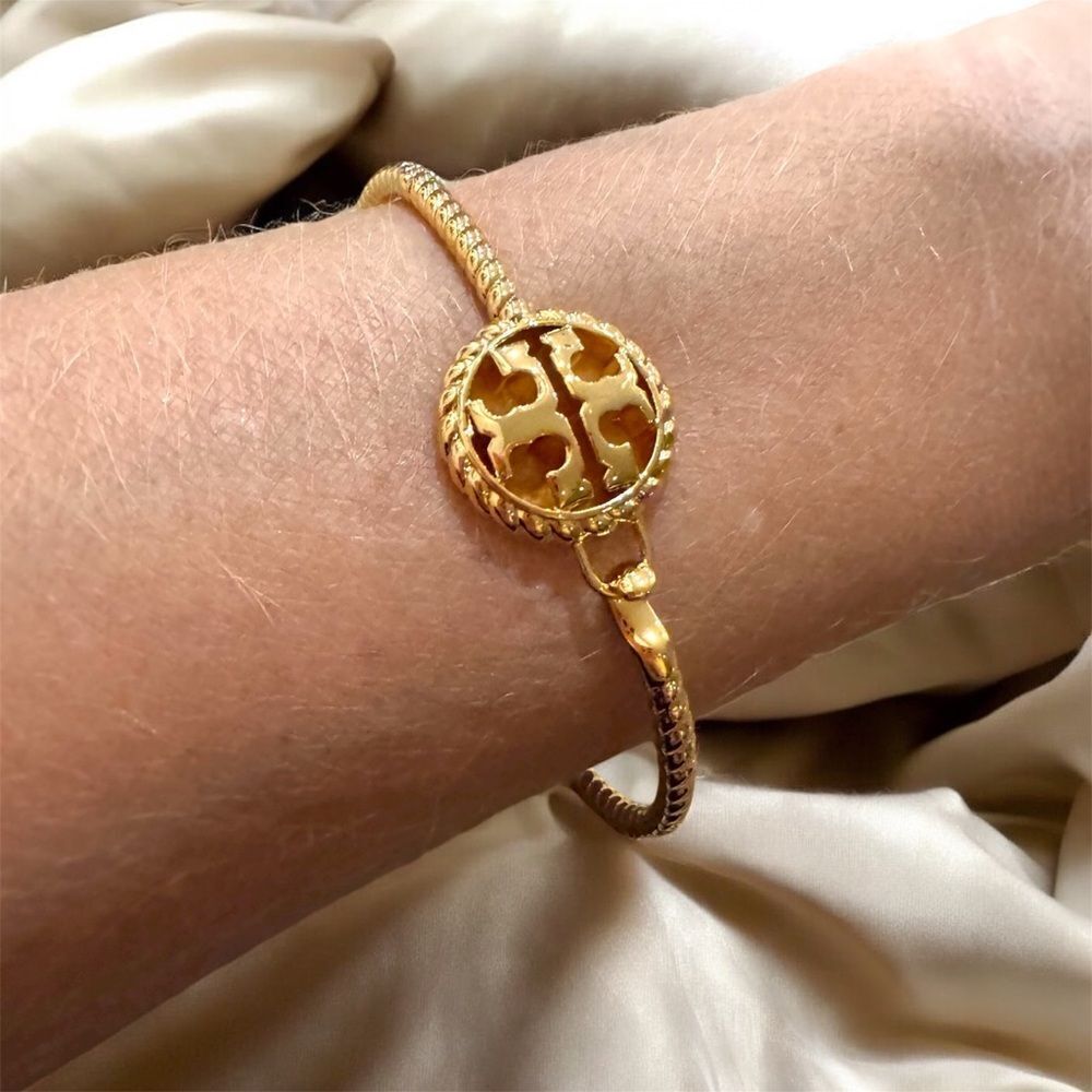 TORY BURCH ROPE HINGED 18KGOLD OVER BRASS BRACELET